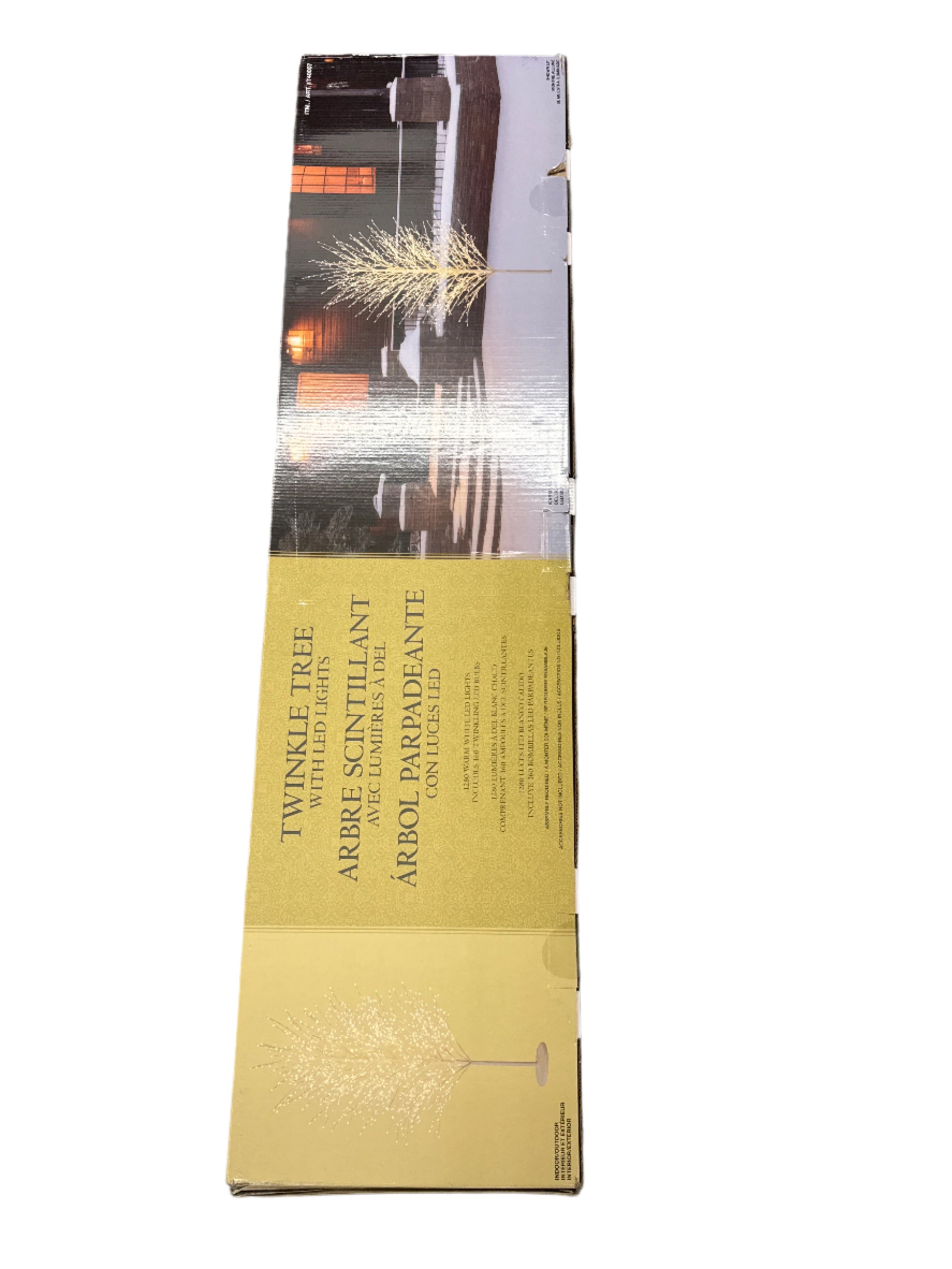 Unopened packaging of a Twinkle Tree with a gray background